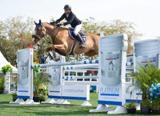 Sameh El Dahan con el podio del $32,000 Platinum Performance CSI3* 1.45m Classic.